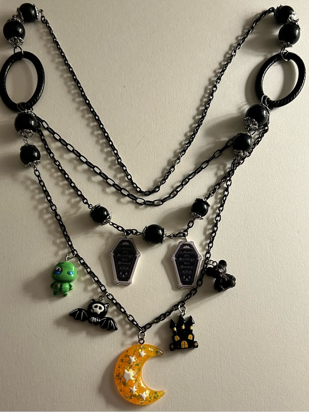 NWOT Haunted Mansion charm Necklace Ghoul Coffins bat, moon, black beads, chains